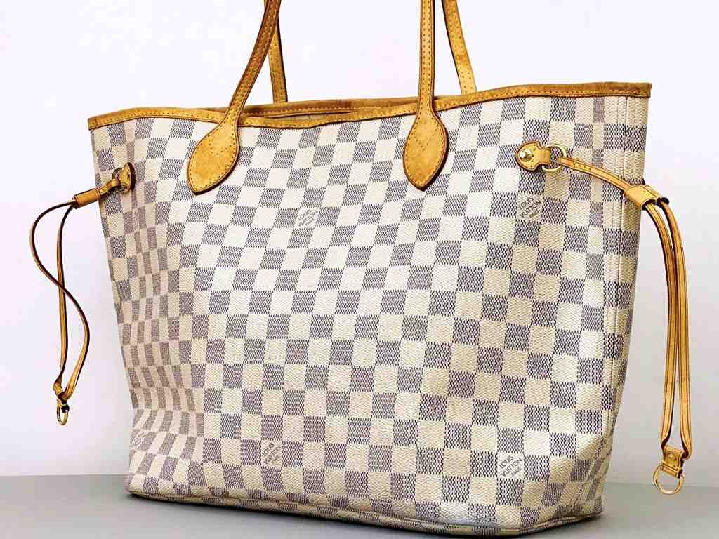 Bolsa Louis Vuitton Neverfull. Clique na imagem e confira mais modelos de bolsa da marca!