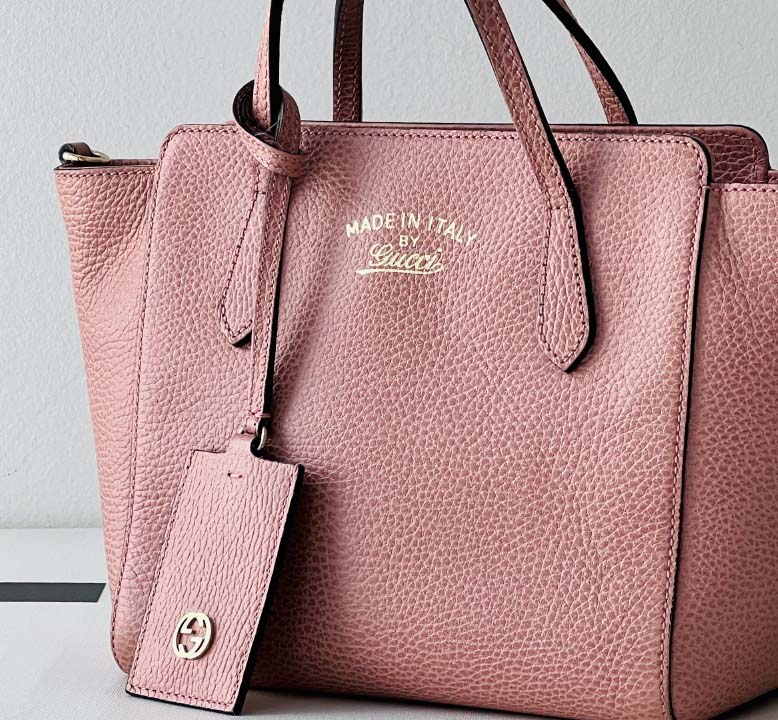 Foto de uma bolsa Gucci.