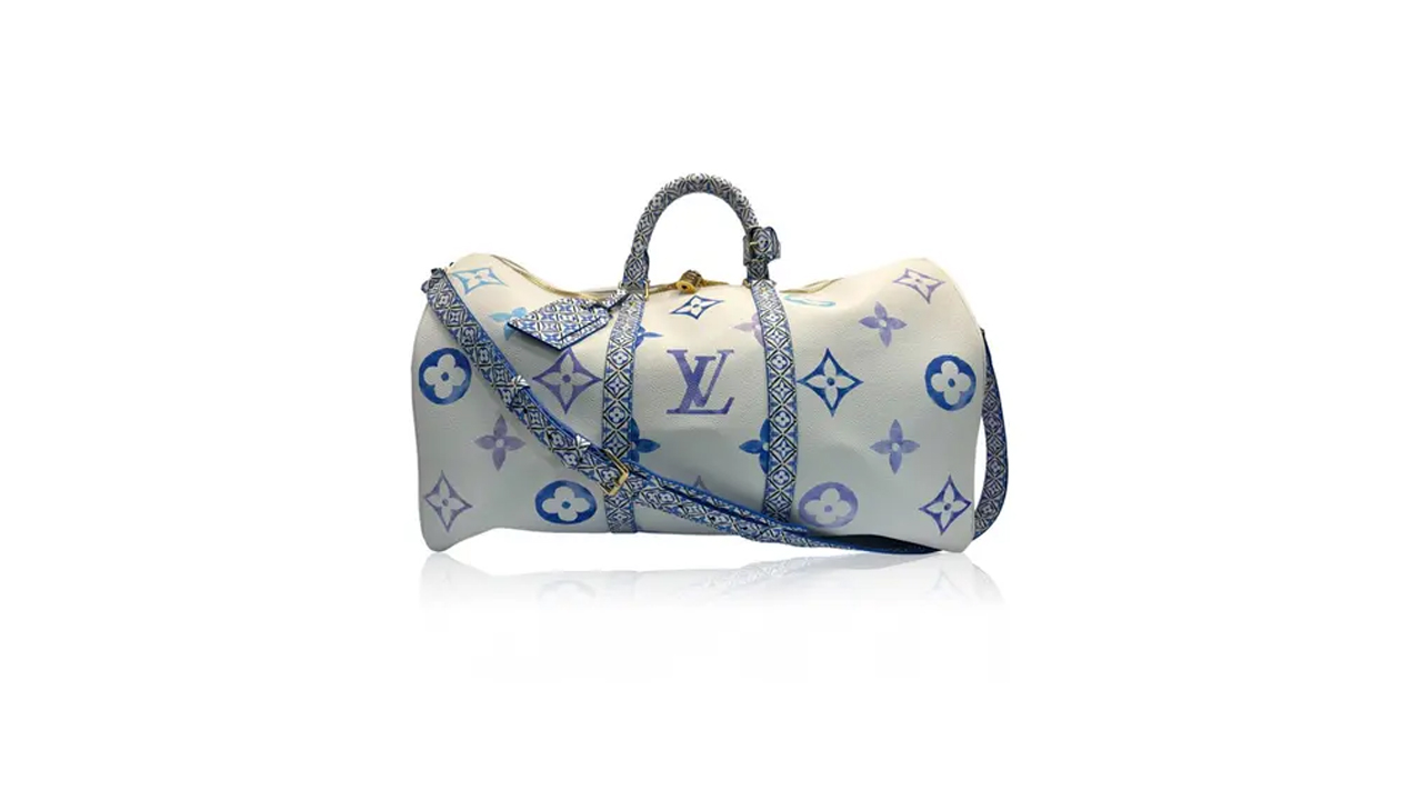 Mala Louis Vuitton Keepall. Clique na imagem e confira mais modelos da marca!