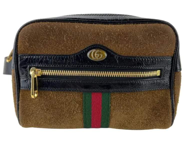 Foto de bolsa gucci modelo ophidia em couro camurça marrom.