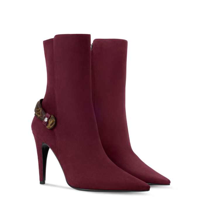Foto de ankle boot de suede da marca Louis Vuitton.