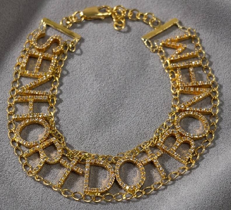 Foto de Pulseira marca de joalheria nacional, Carlos Rodeiro, modelo Senhor do Bonfim Ouro e Diamantes.