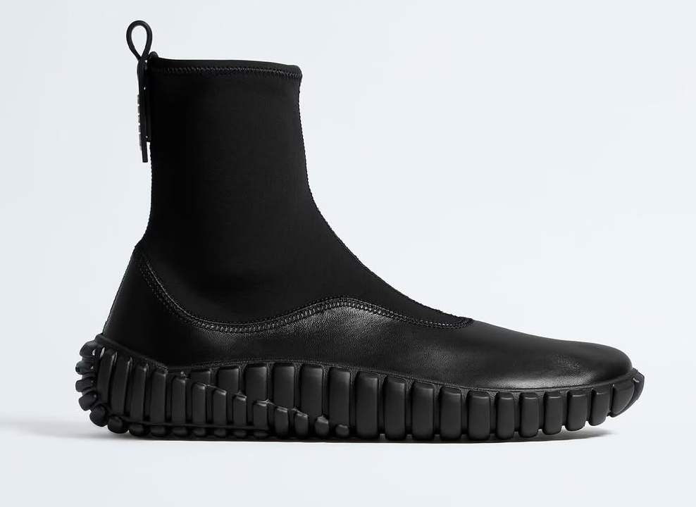 Foto de tênis de luxo de cano alto.