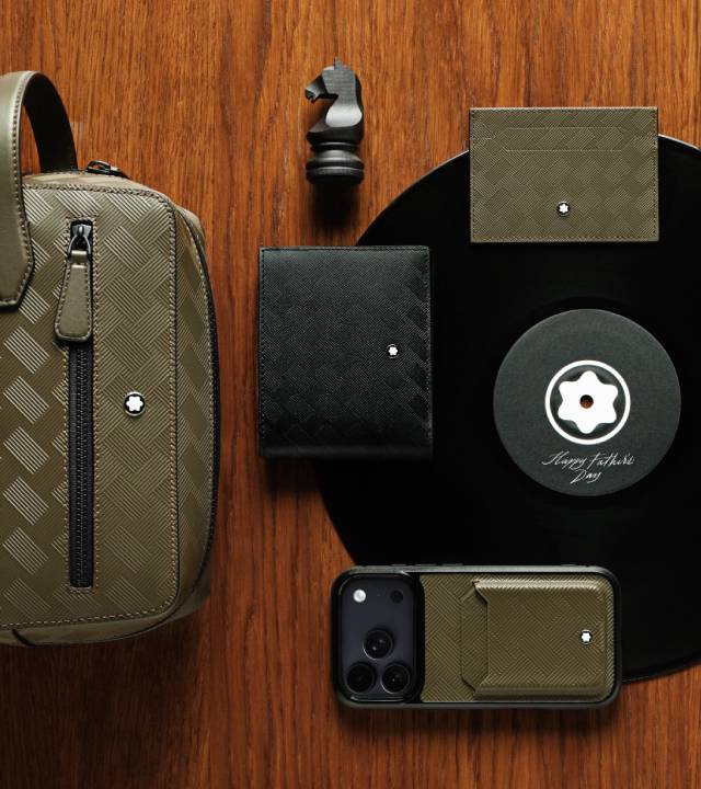 Foto com produtos que a Montblanc vende além de canetas de luxo: bolsa, carteira, porta-cartões, relógios, case de celular.